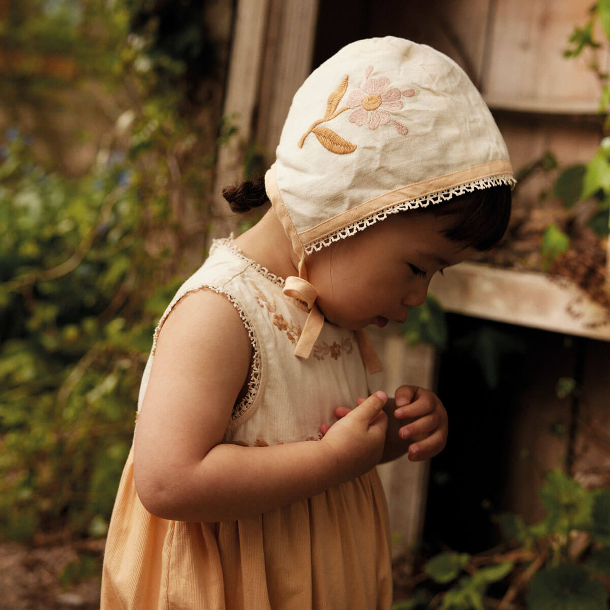 Clara Baby Bubble Romper in Cream / Peach Yoghurt by Apolina