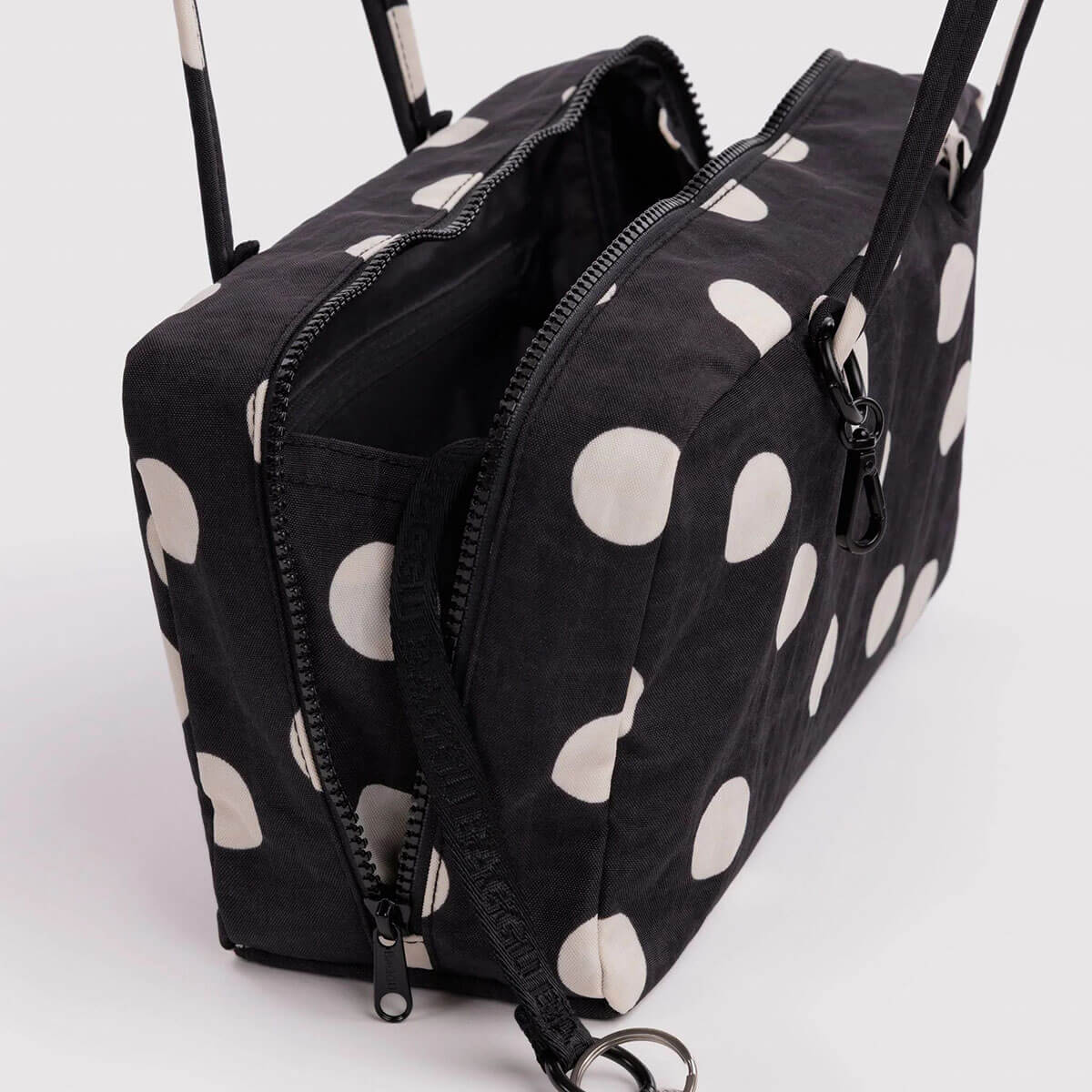 Medium Nylon Bowler Bag in Black And Cream Polka Dot by Baggu