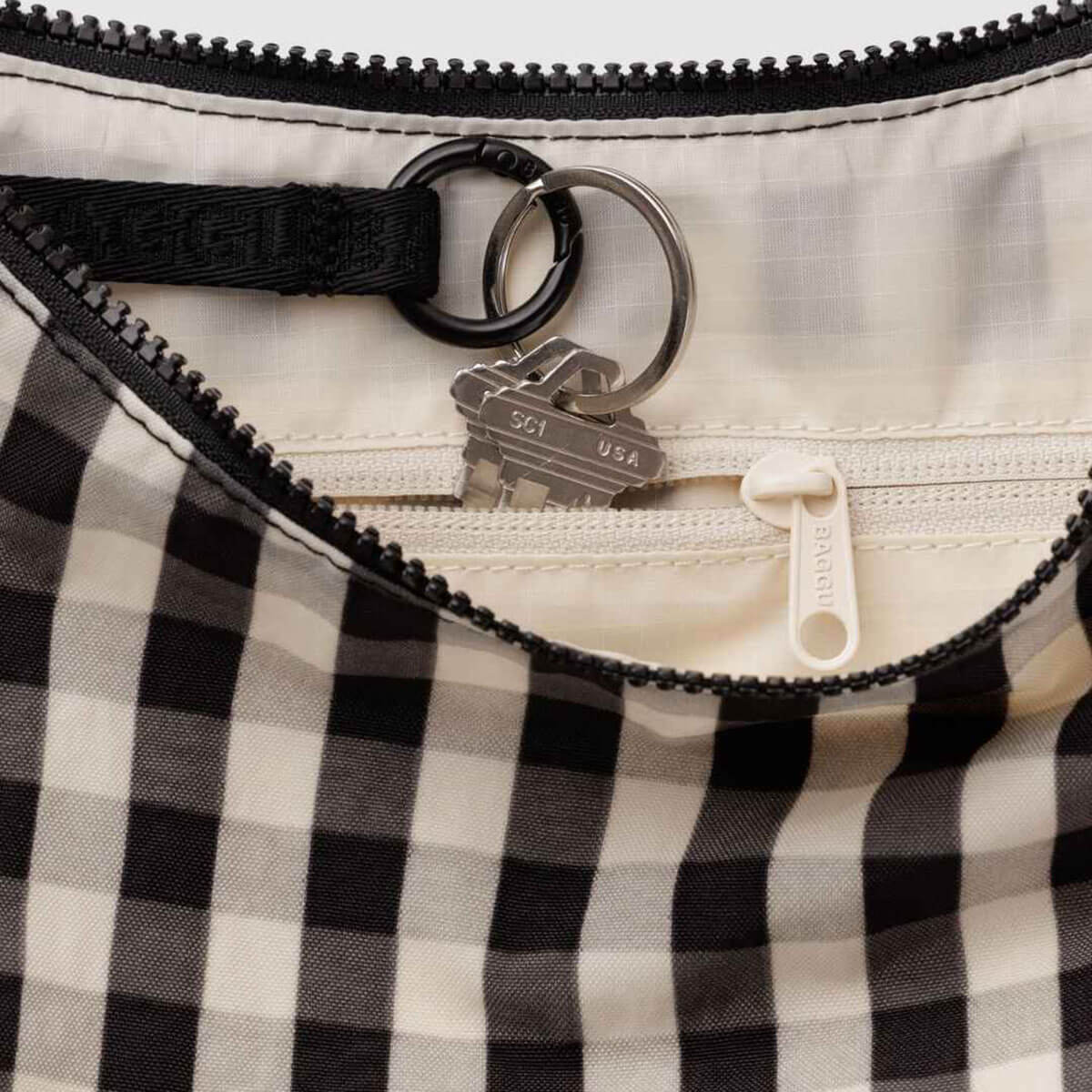 Medium Nylon Crescent Bag in Black And Cream Gingham by Baggu