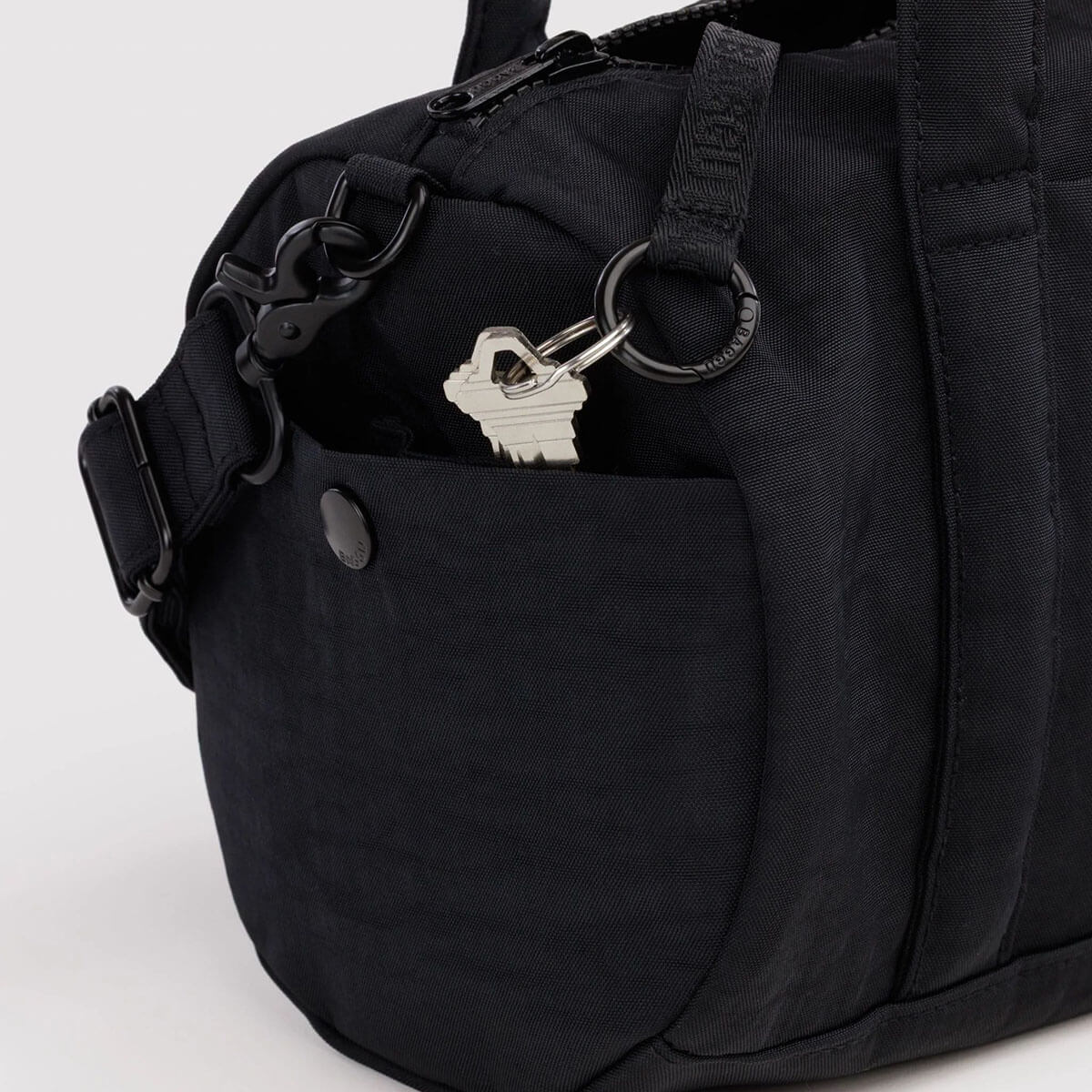 Nylon Duffle Bag in Black by Baggu