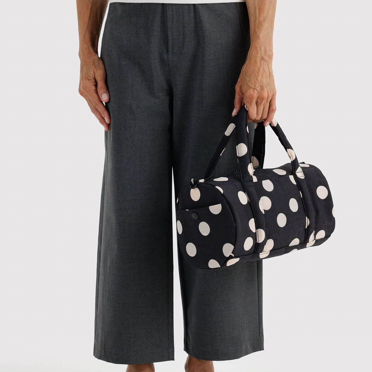 Nylon Duffle Bag in Black And Cream Polka Dot by Baggu