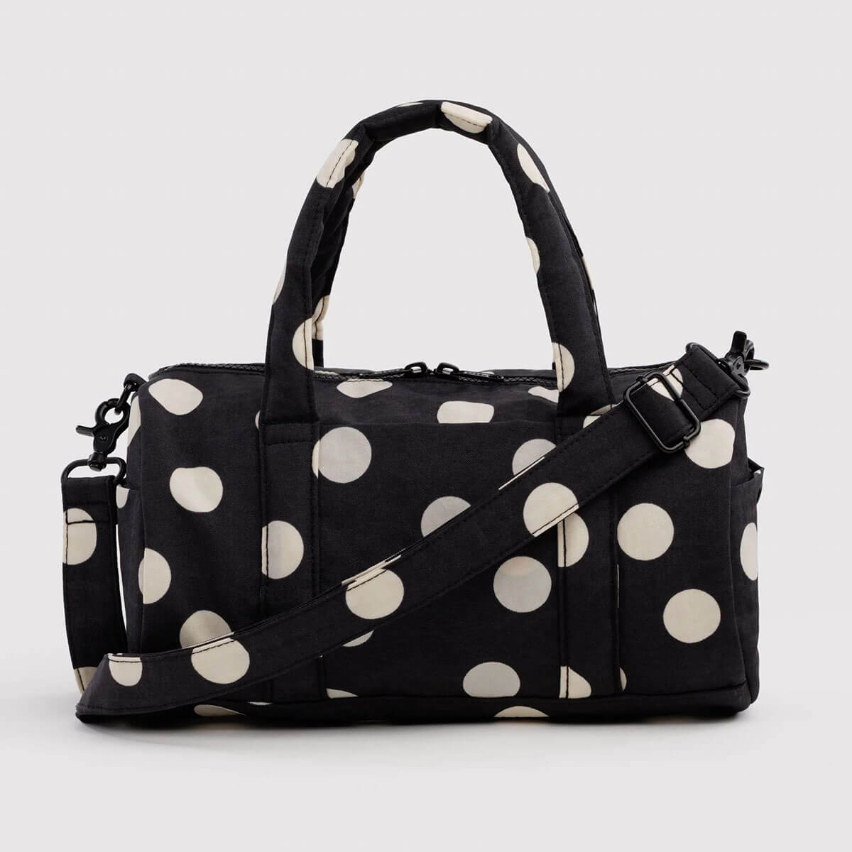 Nylon Duffle Bag in Black And Cream Polka Dot by Baggu