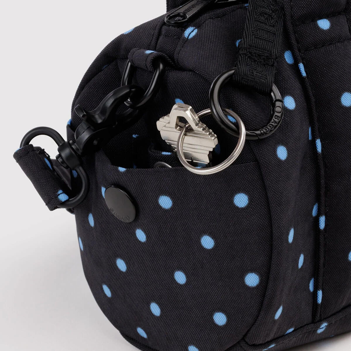 Small Nylon Duffle Bag in Black And Sky Blue Micro Dot by Baggu
