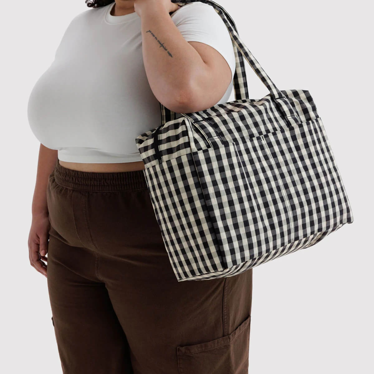 Small Cloud Carry-On Bag in Black and Cream Gingham by Baggu