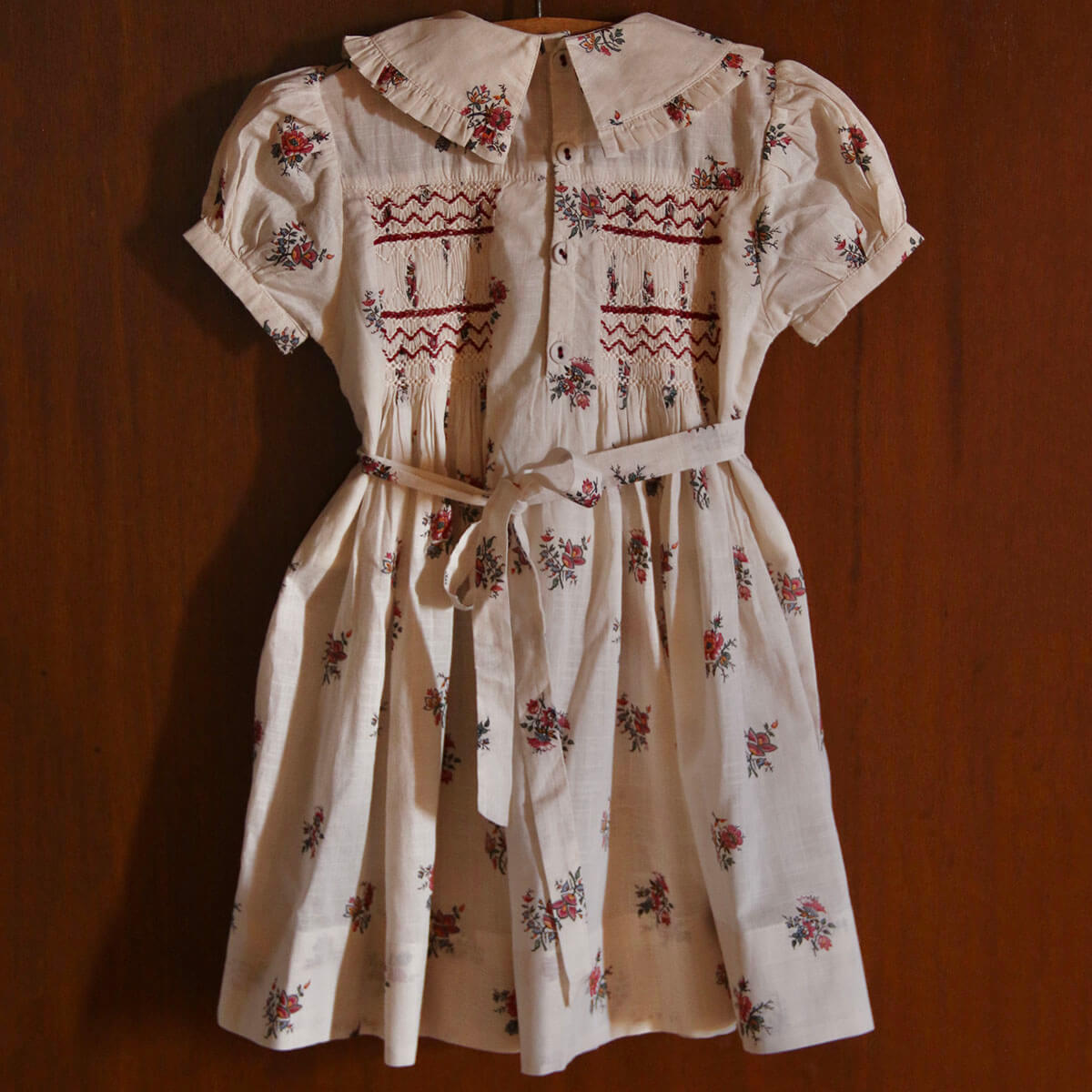 Handsmock Apron Dress in Garden Flowers Print by Bonjour