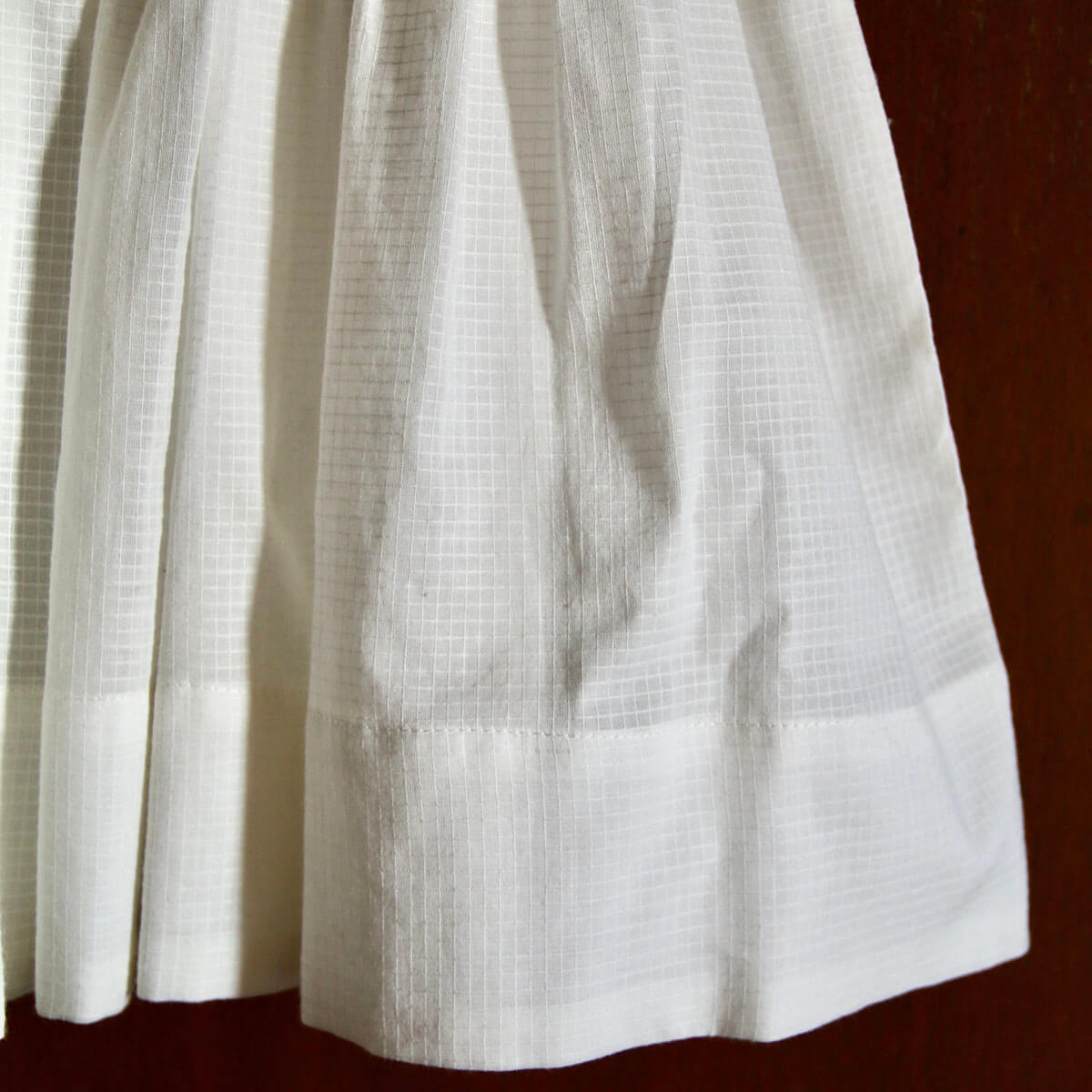 Handsmock Apron Dress in Natural Check by Bonjour