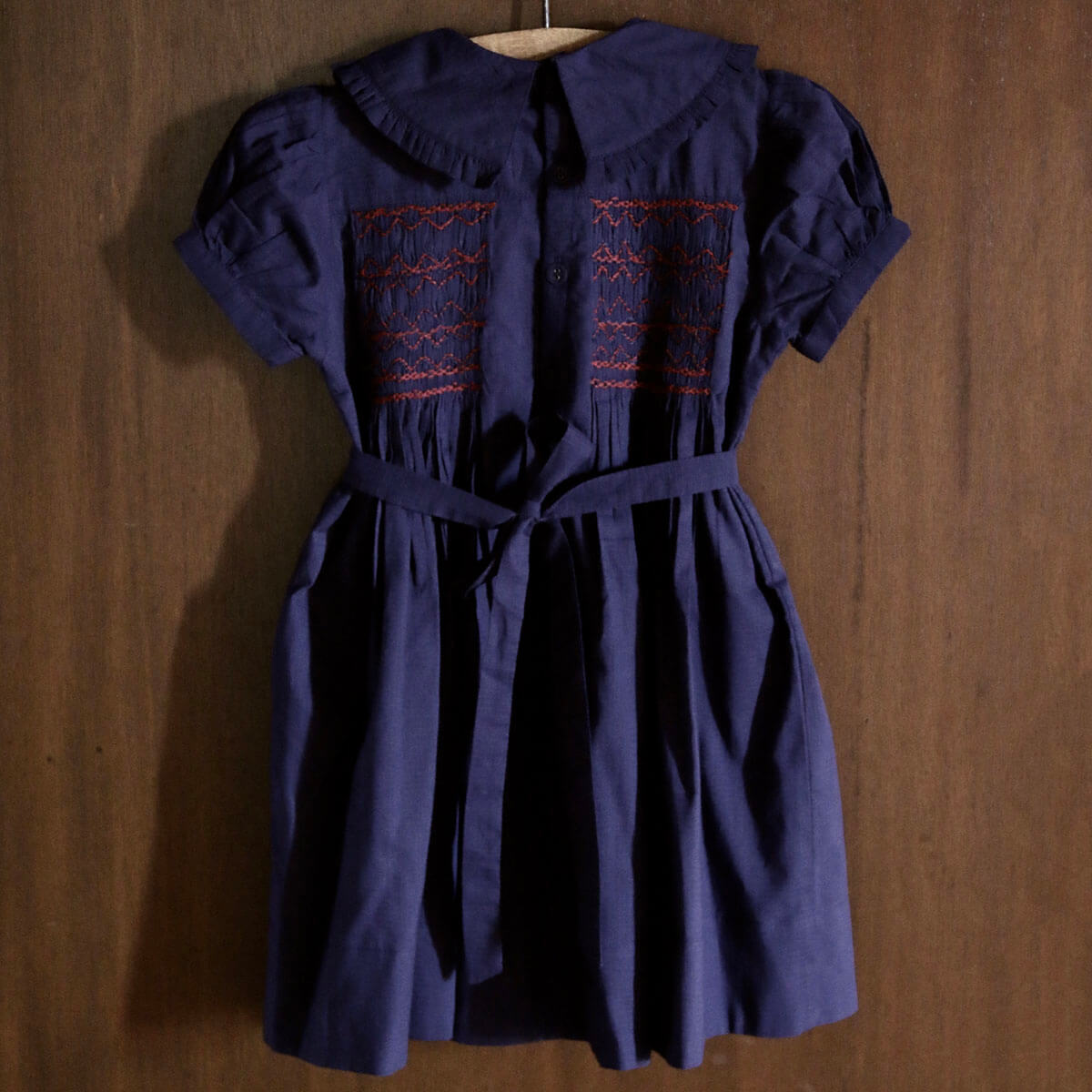 Handsmock Apron Dress in Navy Check by Bonjour