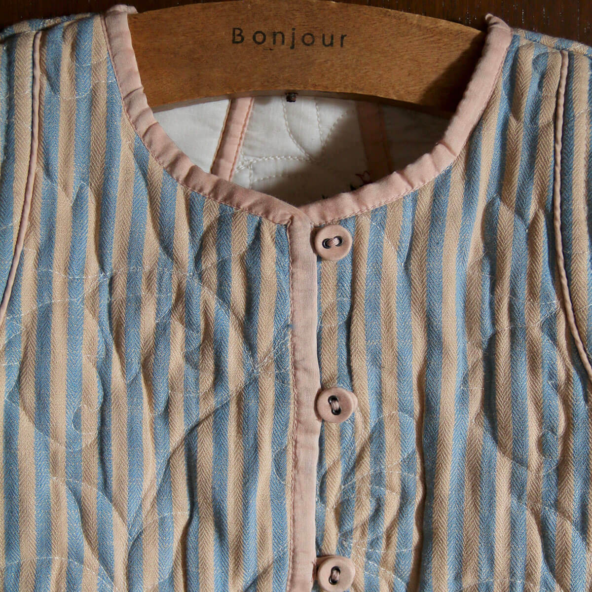 Reversible Quilted Vest in Garden Flowers Print by Bonjour