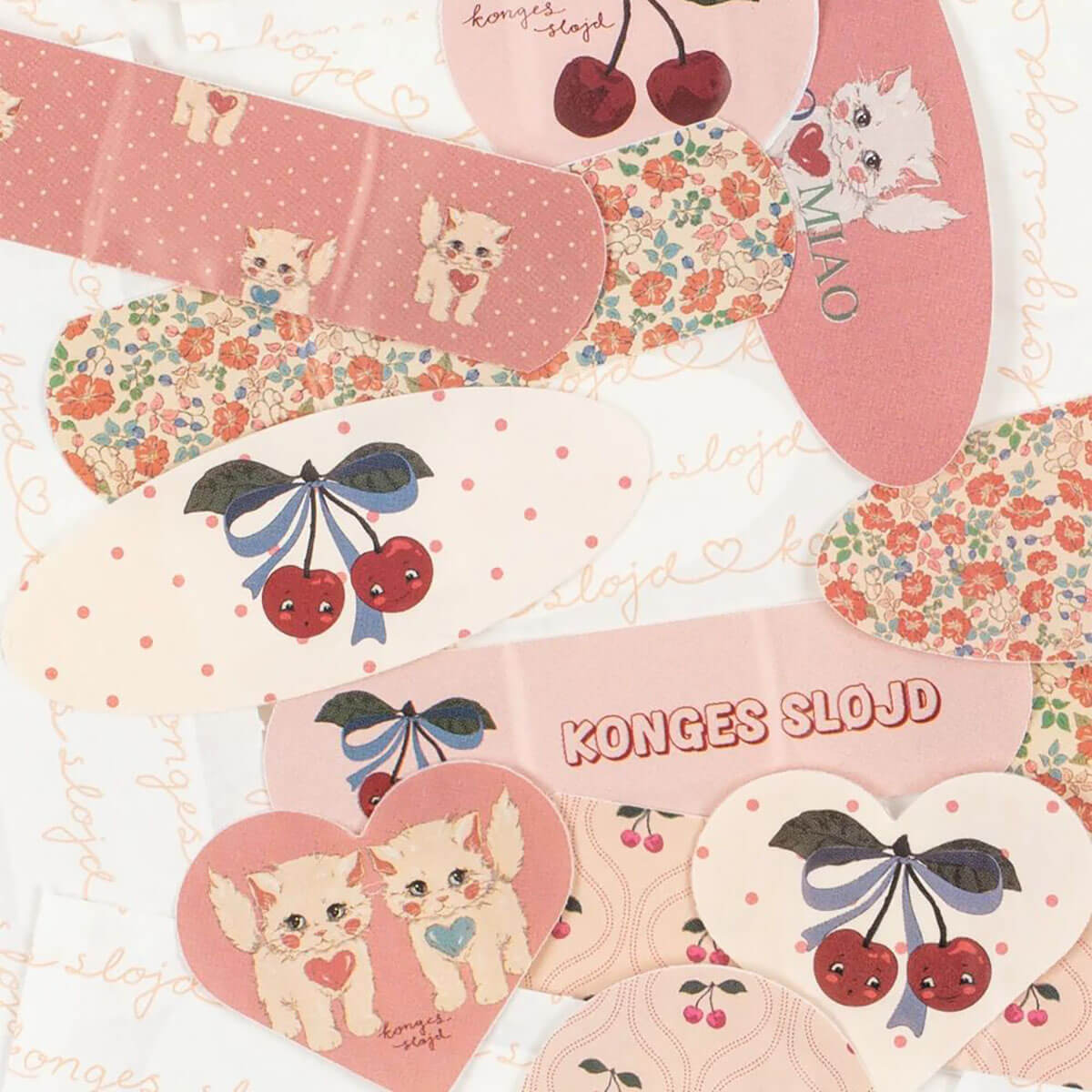 Kiss And Comfort Bandages in Cherry by Konges Sløjd