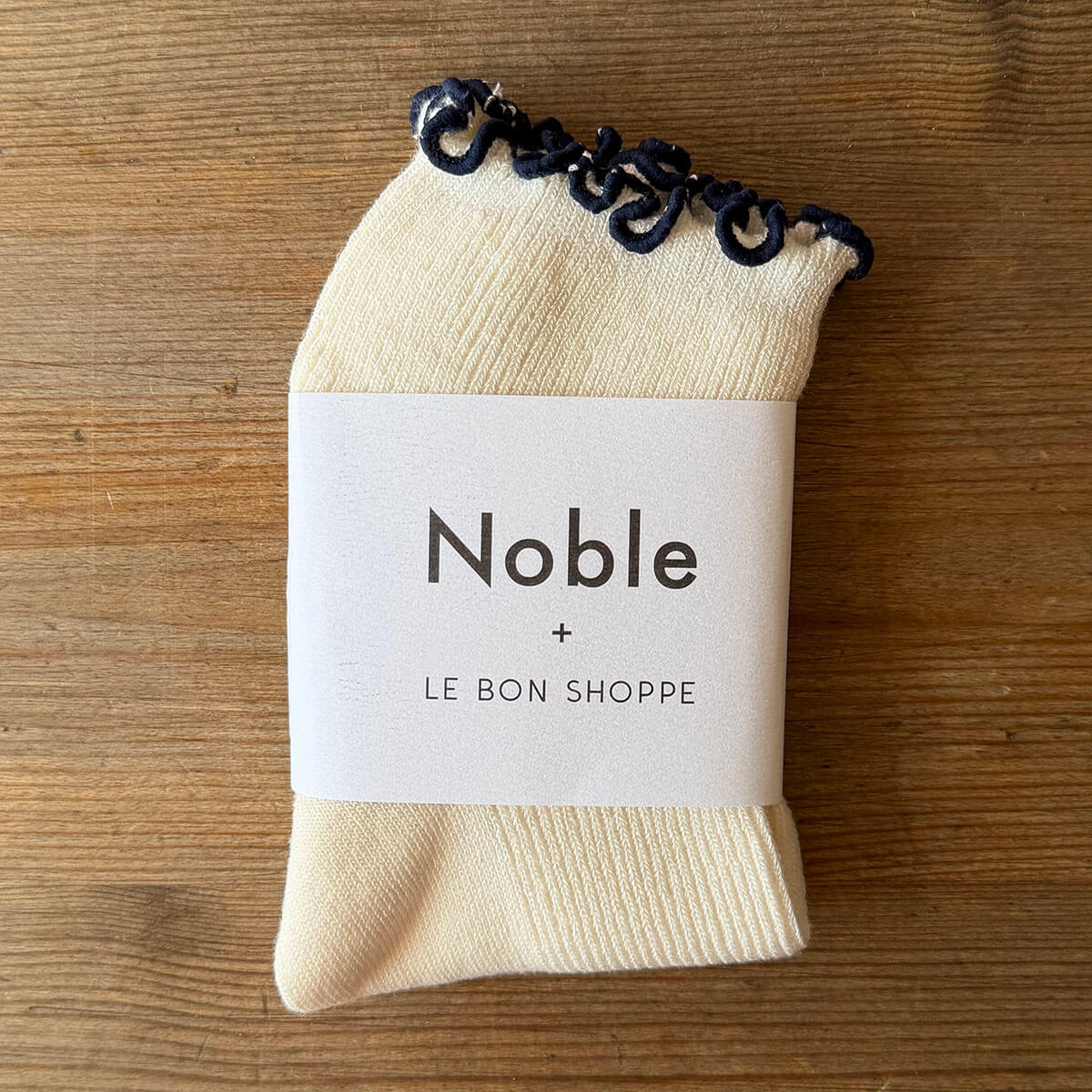 The Petite Ruffled Hugger Adult Modal Socks in Soft White / Navy by Le Bon Shoppe
