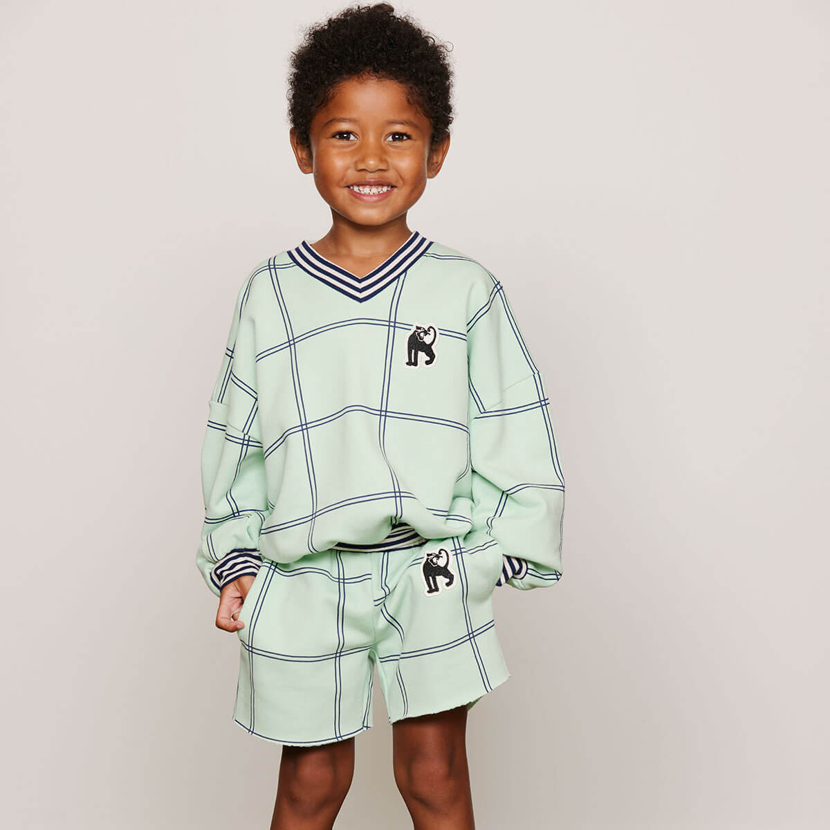 Check AOP Panther Patch Sweatshorts by Mini Rodini