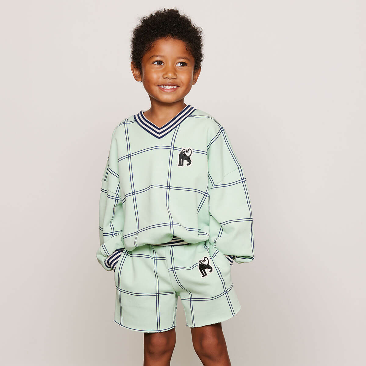 Check AOP Panther Patch Sweatshorts by Mini Rodini