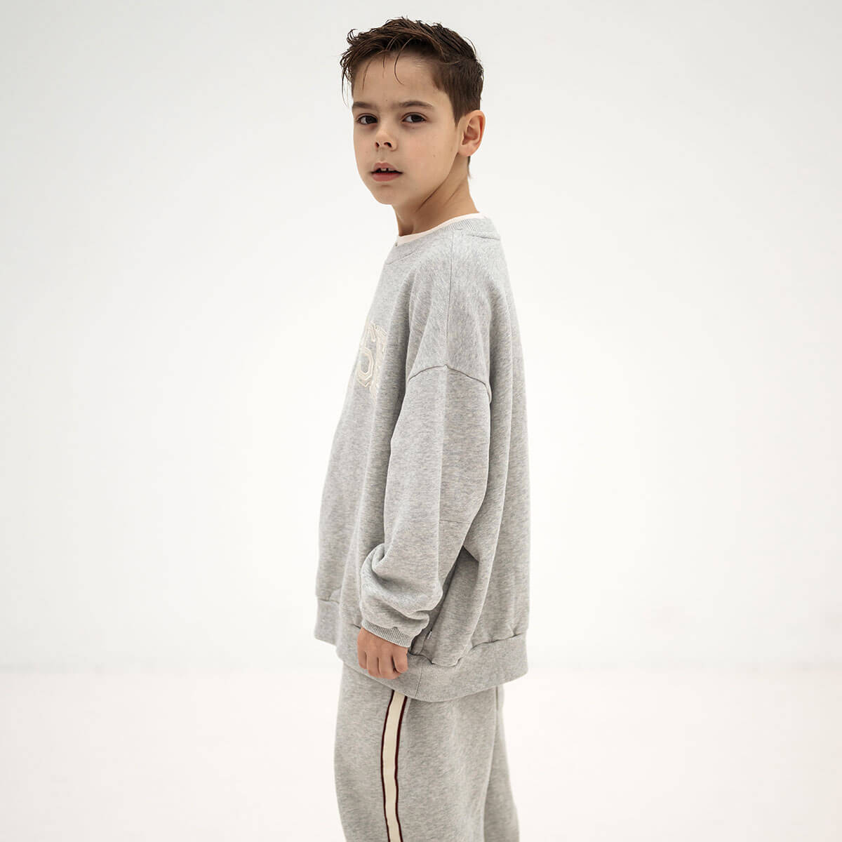 Cozydrop Sweater in Light Mixed Grey by Repose AMS
