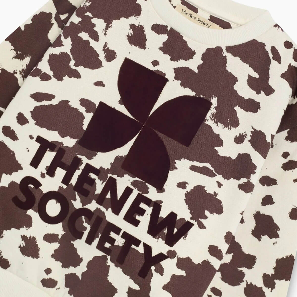 TNS Logo Sweatshirt in Cow Print by The New Society
