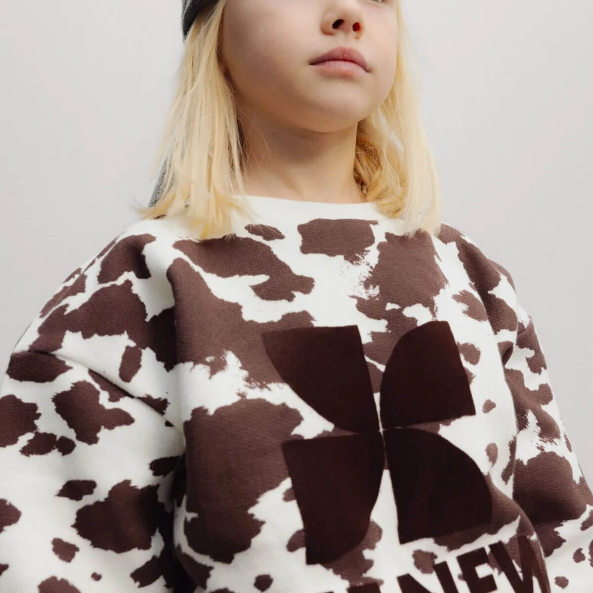 TNS Logo Sweatshirt in Cow Print by The New Society