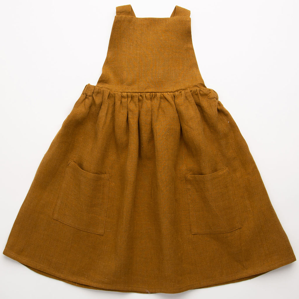 Conkers Pinafore in Burnt Caramel by Nellie Quats