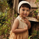 Clara Baby Bubble Romper in Cream / Peach Yoghurt by Apolina