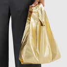 Baby Bag in Gold Metallic by Baggu