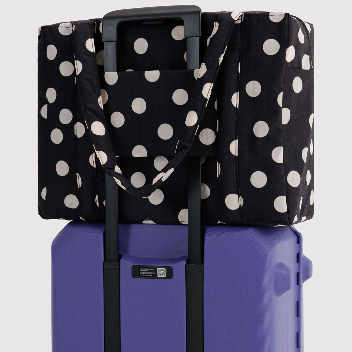 Cloud Carry-On Bag in Black And Cream Polka Dot by Baggu