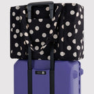Cloud Carry-On Bag in Black And Cream Polka Dot by Baggu