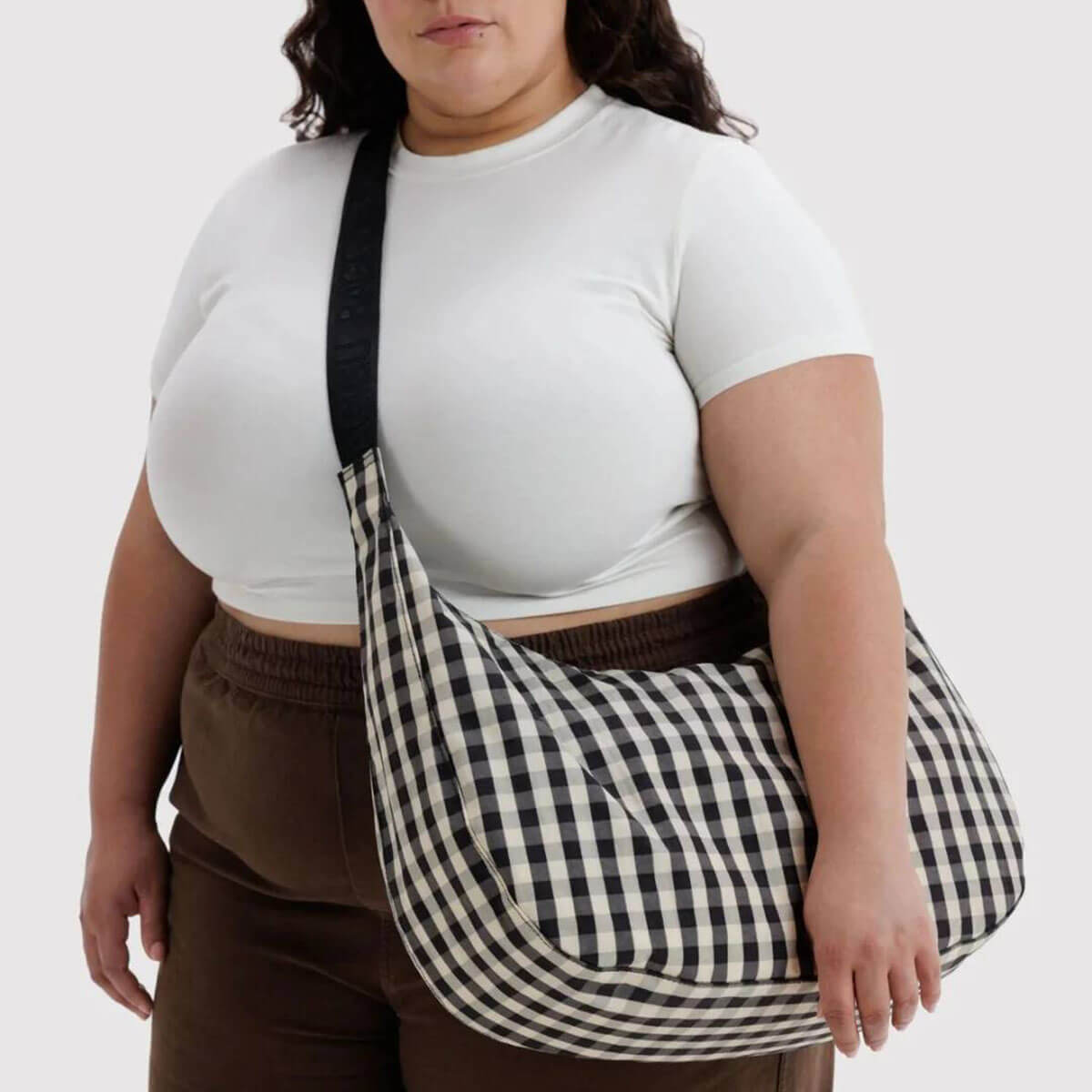 Large Nylon Crescent Bag in Black And Cream Gingham by Baggu