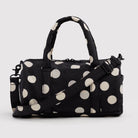 Nylon Duffle Bag in Black And Cream Polka Dot by Baggu