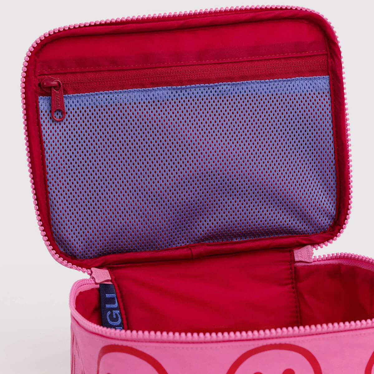 Small Cosmetic Case in Azalea Pink Happy by Baggu