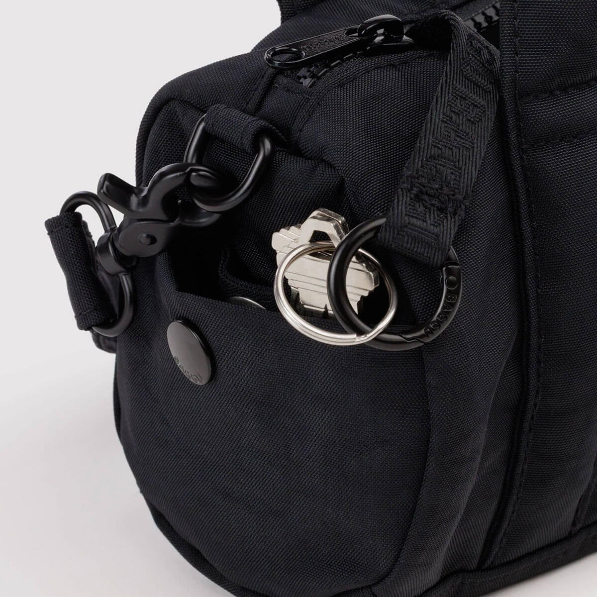 Small Nylon Duffle Bag in Black by Baggu