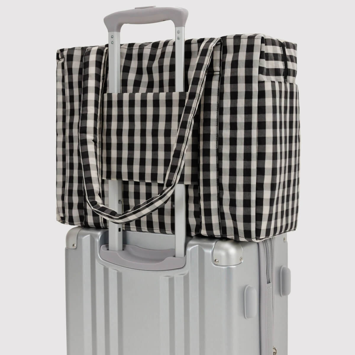 Small Cloud Carry-On Bag in Black and Cream Gingham by Baggu