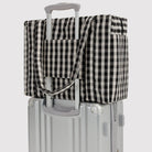 Small Cloud Carry-On Bag in Black and Cream Gingham by Baggu