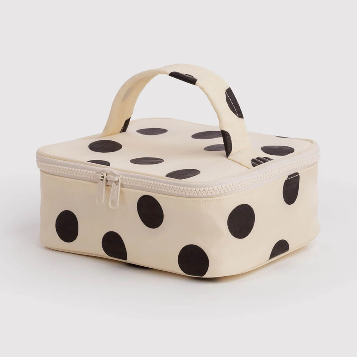 Small Cosmetic Case in Cream and Black Polka Dot by Baggu