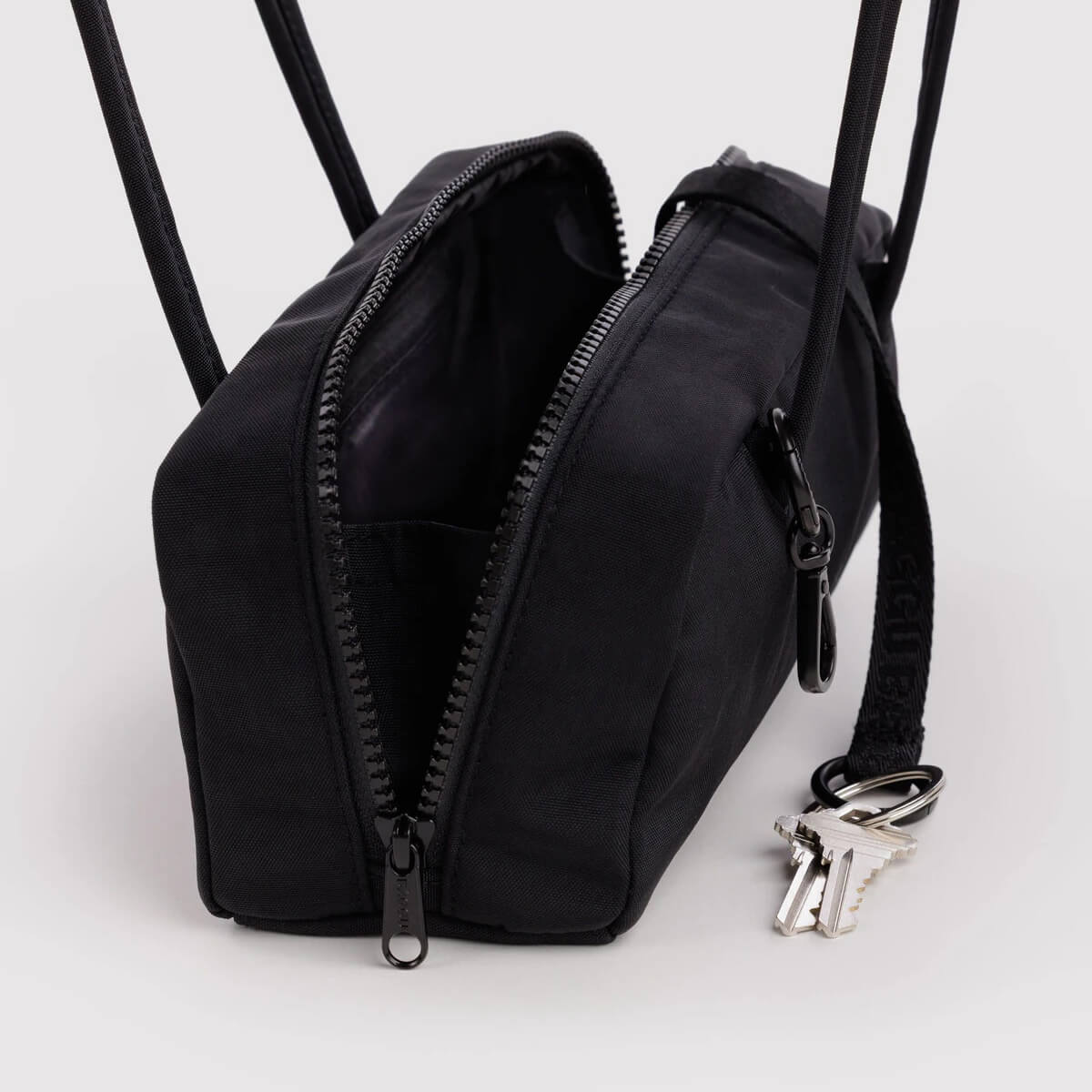 Small Nylon Bowler Bag in Black by Baggu
