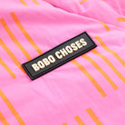 Almost Moiré All Over Reversible Anorak in Fuchsia by Bobo Choses