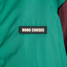 Reversible Nylon Sherpa Jacket in Dark Brown by Bobo Choses Womenswear