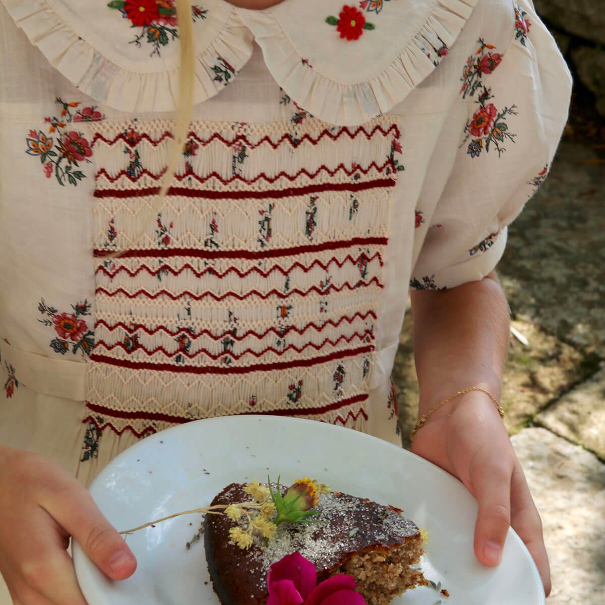 Handsmock Apron Dress in Garden Flowers Print by Bonjour
