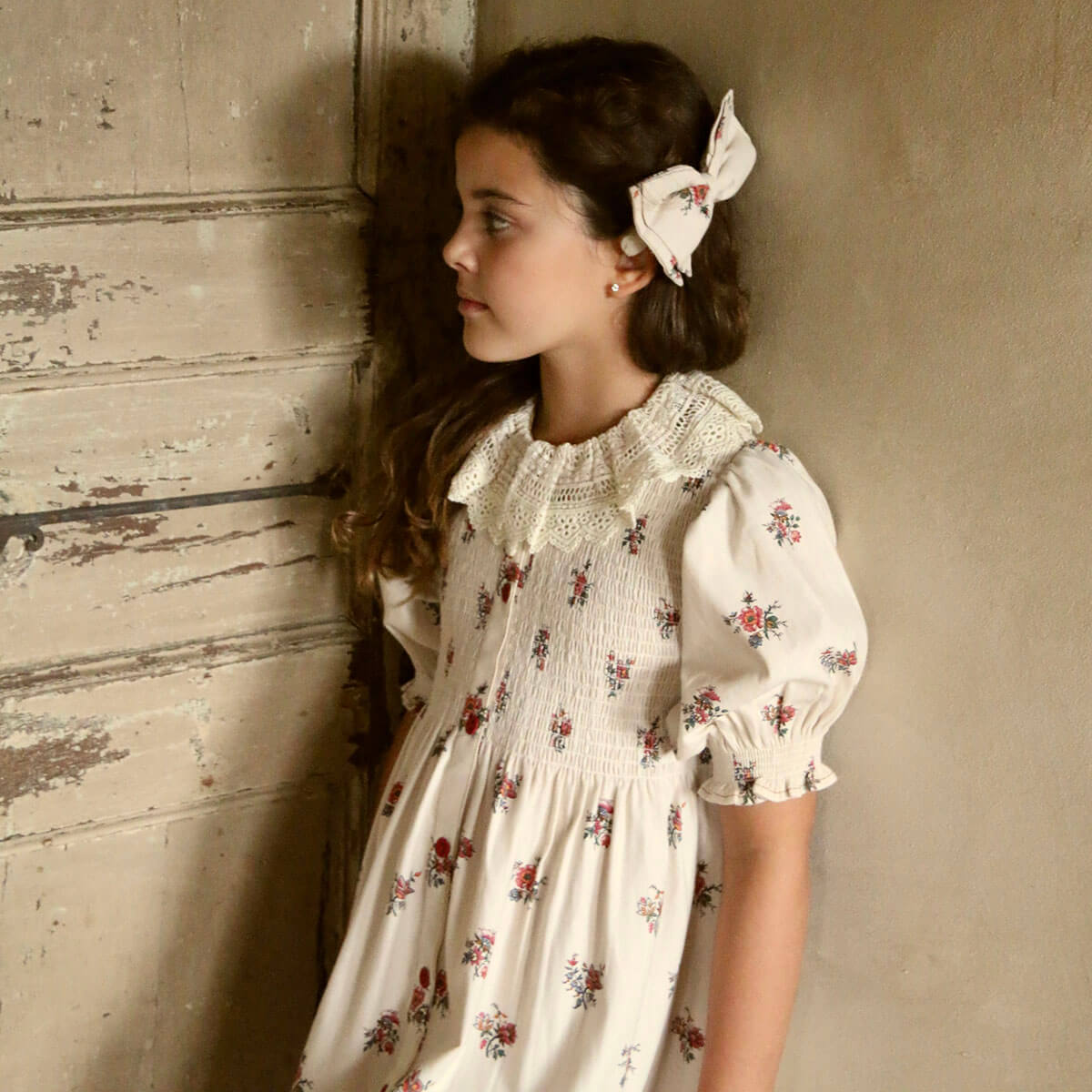 Handsmock Apron Dress in Garden Flowers Print by Bonjour
