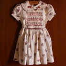 Handsmock Apron Dress in Garden Flowers Print by Bonjour
