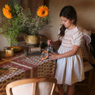 Handsmock Apron Dress in Natural by Bonjour