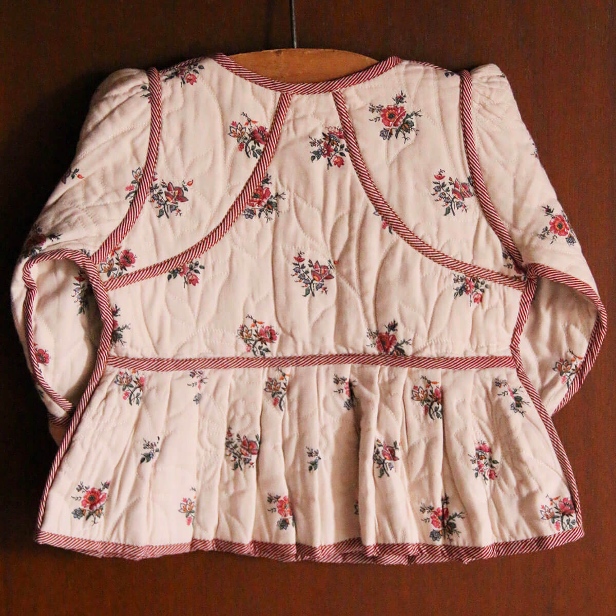 Reversible Quilted Jacket in Garden Flowers Print by Bonjour
