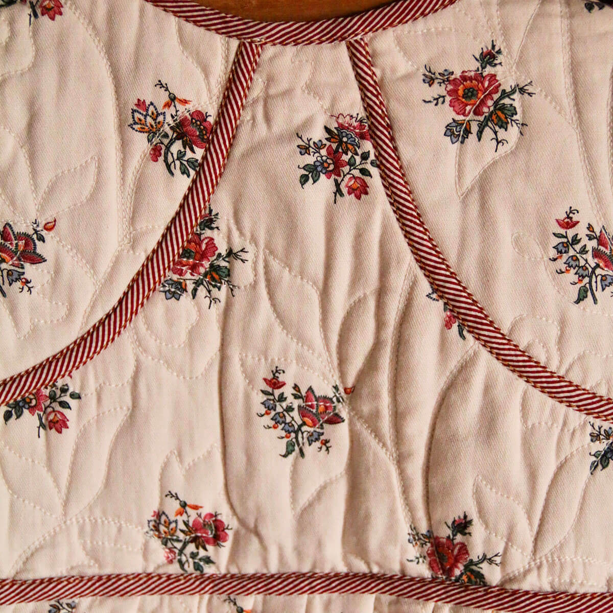 Reversible Quilted Jacket in Garden Flowers Print by Bonjour