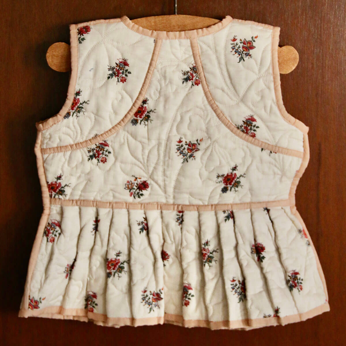 Reversible Quilted Vest in Garden Flowers Print by Bonjour