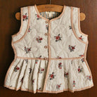 Reversible Quilted Vest in Garden Flowers Print by Bonjour