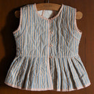 Reversible Quilted Vest in Garden Flowers Print by Bonjour