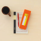 Pen Case in Orange by Hightide Penco