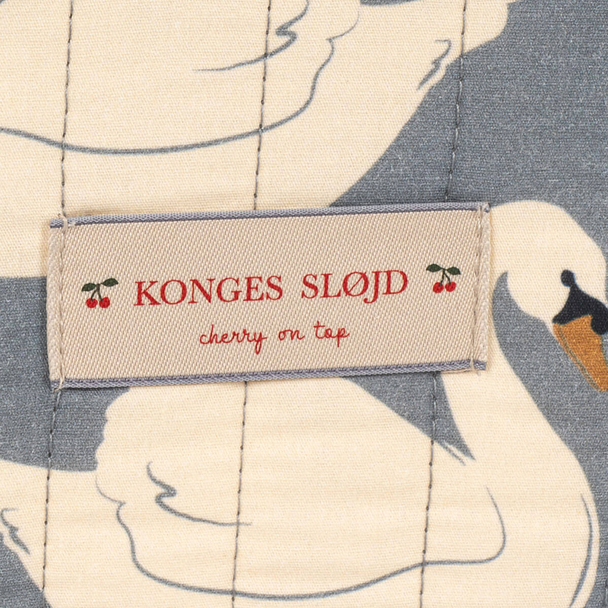 Doll Travel Bed in Swan by Konges Sløjd