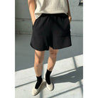 Flared Basketball Shorts in Black by Le Bon Shoppe