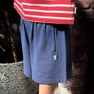 Flared Basketball Shorts in Midnight by Le Bon Shoppe