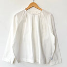 Julienne Long Sleeve Top in White by Le Bon Shoppe