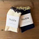 The Petite Ruffled Hugger Adult Modal Socks in Navy / Butter by Le Bon Shoppe