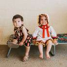 Juice Box Romper in Red Apple by Mabli